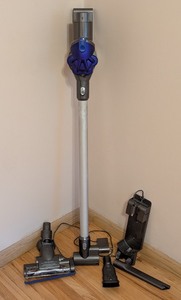 lot 85 image: K - Dyson DC35 Animal Cordless Stick Vacuum with Attachments and Dock
