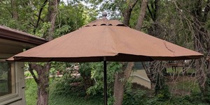 lot 101 image: P - 8ft Brown Patio Umbrella with Weighted Stand