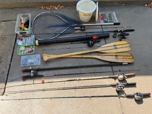 lot 167 image: Large Fishing and Boating Gear Lot with Rods, Lures, Paddles, and Accessories