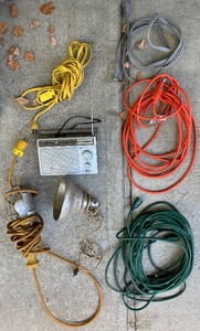 lot 174N image: Lot of Extension Cords, Work Lights, and GE Portable Radio