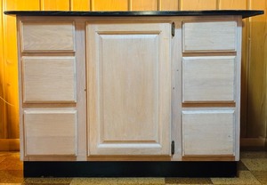 lot 25H image: LL - Merillat White Washed Kitchen Cabinet with Black Top Slab