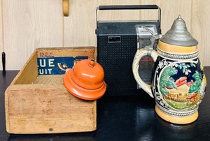 lot 142H image: LL - Vintage Wooden Crate, German Beer Stein, Radio, and Metal Bell Lot