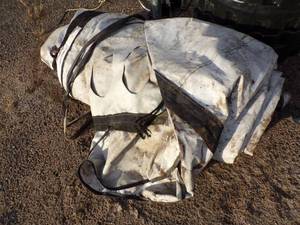 lot 25 image: Large Tarp may have holes or rips good for Woodpile Gray