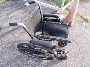 lot 45 image: Folding Wheelchair