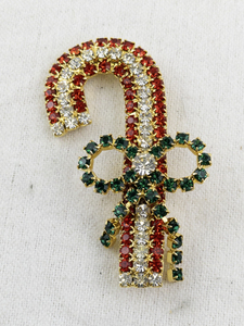 lot 26 image: Rhinestone Candy Cane Brooch with Green Bow