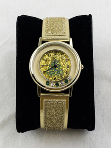lot 28 image: Gold Tone Holiday Wristwatch with Glitter Strap and Tree Dial -Working