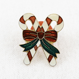 lot 43 image: Vintage Candy Cane Enamel Lapel Pin with Bow