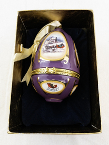 lot 101 image: Mr. Christmas Hinged Egg Music Box Ornament with Winter Scene