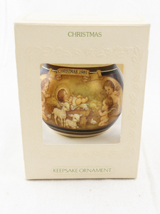lot 107 image: Hallmark 1981 Satin Christmas Keepsake Ornament with Nativity Scene