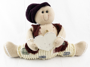 lot 113 image: Plush Rag Doll with Heart and Patchwork Outfit