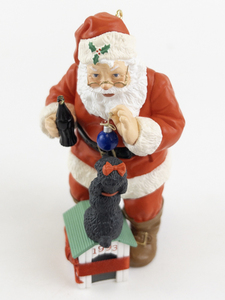 lot 15G image: 1992 Coca-Cola Santa with Black Dog Christmas Ornament