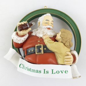 lot 15I image: 1988 Coca-Cola Santa and Child Christmas Is Love Ornament