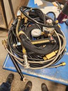 lot 31 image: Collection of Misc Hoses and Torches (587992)