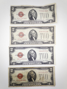 lot 389 image: 4 Red Seal $2 Dollar Bills Series 1928 G US Currency