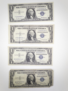 lot 393 image: 4 US Silver Certificate One Dollar Bills 1935E 1935G 1957 Series
