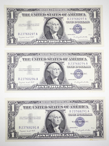 lot 394 image: 3 Uncirculated 1957A $1 Silver Certificates Consecutive Serial Numbers