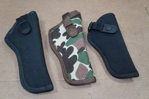 lot 304 image: 3 Gun Holsters