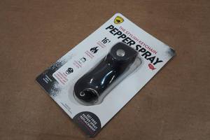 lot 100 image: Guard Dog Pepper Spray Keychain