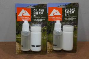 lot 103 image: 2 Ozark Trail Oil and Grease Kit