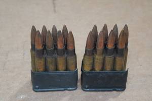 lot 390 image: 16 .30-06 FMJ Rounds in Clips