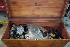 lot 58 image: Antique Wood Chest with Contents - Car Parts, Lights