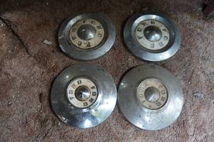 lot 163 image: 1950s Ford Hub Caps
