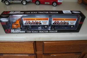 lot 213 image: Die Cast Promotions 164 Scale Tractor Trailer - Yellow