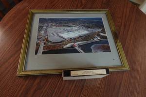 lot 142 image: Framed Photo of Ford Assembly Plant and Employee Celebration VHS