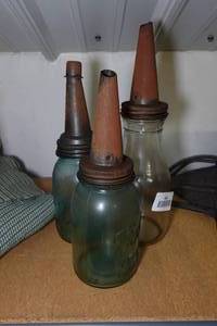 lot 405 image: Glass Jars with Antique Oil Spouts