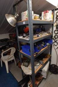 lot 410 image: Shelf with Contents - Automotive Lights, Caps, Hitches