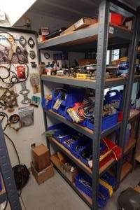 lot 412 image: Shelf with Contents - Chain, Small Parts, Ditributors, Spark Plugs