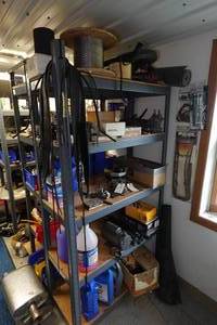 lot 413 image: Shelf with Contents - Wire, Fuel Pumps, Small Parts, Brake Rotors