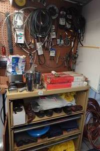 lot 444 image: Metal Shelf and Parts - Shocks, Belts, Fish Tape, Snap-On Driver