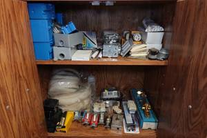 lot 447 image: Contents of Cabinet - Switches, Harris Torches, 3M Buffing Pads