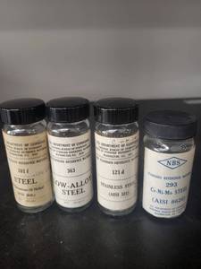 lot 76L image: Set of 4 NBS Standard Reference Steel Samples in Glass Vials