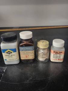 lot 81L image: Set of 4 Sample Bottles Nickel, Graphite, Zinc, and Gray Iron Powders