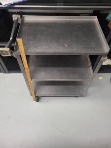 lot 89L image: Stainless Steel Three-Shelf Utility Cart with Handle and Caster Wheels