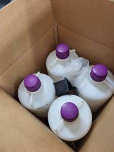lot 91L image: Box of 4 Large Plastic DI Water Jugs with Dispenser Tops