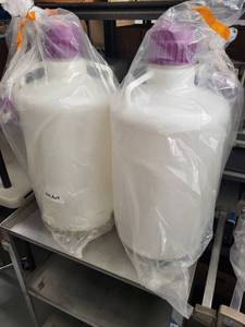 lot 93L image: Set of 2 10-Liter Plastic Carboys with Spigots and Purple Caps