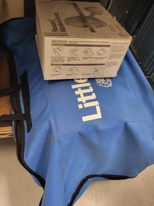 lot 126L image: Laerdal Little Anne CPR Training Manikin with Carry Bag and 6 Resusci Manikin Faces