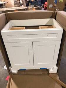 lot 10 image: Glacier Bay Everdean 31 in. Single Sink White Bath Vanity (Top Not Included)  Customer Returns See Pictures