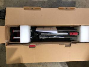lot 53 image: Husky 24 in. Tile Cutter with Tungsten Carbide Blade and Adjustable Gauge  Customer Returns See Pictures