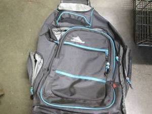 lot 392 image: High Sierra backpack with wheels an...