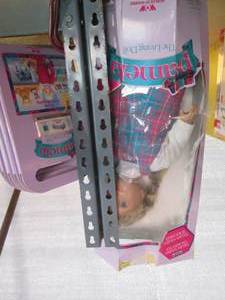 lot 23 image: Large size Pamela doll with multipl...