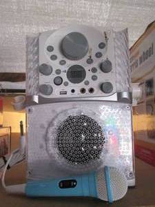 lot 25 image: Karaoke machine with microphone (no...