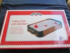 lot 30 image: Tabletop air hockey game in origina...