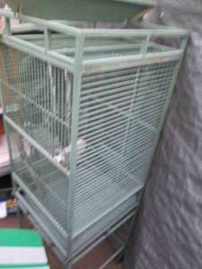lot 111 image: Metal 4ft elevated rolling bird cag...