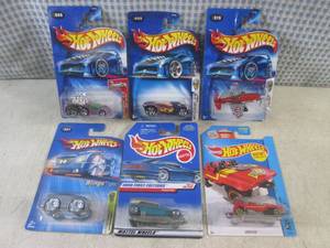 lot 210 image: (EC1) Assorted Hot Wheels in Packag...
