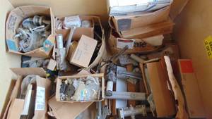 lot 42 image: Over 25 Door Closers, 90% New In Box and Misc Door Hardware