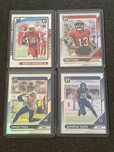 lot 9 image: Set of 4 2024 Donruss Optic NFL Football Cards, Including Marvin Harrison Jr. Rated Rookie
